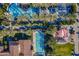 An aerial view of the pool area displaying clear blue water, lounge chairs, landscaping, sidewalks and recreational areas at 841 E Farmers Ln, Queen Creek, AZ 85140