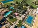 Aerial view of community amenities including tennis courts, pool, and green spaces at 841 E Farmers Ln, Queen Creek, AZ 85140
