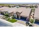 Exterior of the property featuring desert landscaping, tile roof, and a paver driveway at 841 E Farmers Ln, Queen Creek, AZ 85140