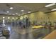 A spacious fitness center equipped with state-of-the-art workout machines, ample space and inspiring decor at 841 E Farmers Ln, Queen Creek, AZ 85140