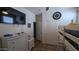 Spacious bedroom features a bunk bed, ceiling fan, wall mounted TV and large closet at 8419 S 40Th Dr, Laveen, AZ 85339