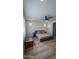 Simple bedroom features natural light, minimalist decor, and neutral tones creating a relaxing atmosphere at 8419 S 40Th Dr, Laveen, AZ 85339