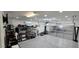 A tidy garage featuring epoxy floors, organized shelving, and ample storage space at 8419 S 40Th Dr, Laveen, AZ 85339