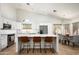 Spacious kitchen with modern appliances, a breakfast bar, and easy access to the dining area at 8896 E Mescal St, Scottsdale, AZ 85260