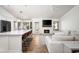 Bright living room with a seamless flow to the kitchen and breakfast nook at 8896 E Mescal St, Scottsdale, AZ 85260