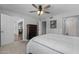 Bright bedroom with neutral walls, and carpet, offering a view to other rooms in the house at 932 Leisure World --, Mesa, AZ 85206