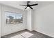 Clean bedroom with carpet flooring, ceiling fan, and window at 948 S Alma School Rd # 97, Mesa, AZ 85210