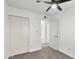 Bedroom featuring carpet, ceiling fan, and a closet at 948 S Alma School Rd # 97, Mesa, AZ 85210