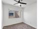 Bedroom with light and bright finish, ceiling fan, and carpet at 948 S Alma School Rd # 97, Mesa, AZ 85210