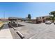 Community parking lot with covered parking spaces available for residents at 948 S Alma School Rd # 97, Mesa, AZ 85210