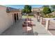 Community pool patio featuring picnic tables, providing ample space for outdoor gatherings and relaxation at 948 S Alma School Rd # 97, Mesa, AZ 85210