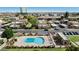 Aerial view of community pool and surrounding neighborhood at 948 S Alma School Rd # 97, Mesa, AZ 85210