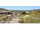 Aerial view of neighborhood showcasing street and mountain views at 9932 N 16Th E Pl, Phoenix, AZ 85020