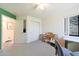 Office or bedroom with closet, doorway, and window showcasing mountain view at 9932 N 16Th E Pl, Phoenix, AZ 85020