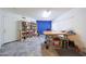 Bonus room featuring tile floors, built-in storage, and ample space for various activities or hobbies at 9932 N 16Th E Pl, Phoenix, AZ 85020