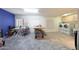 Bright bonus room with large windows, laundry, and space for hobbies or crafts offers extra living area at 9932 N 16Th E Pl, Phoenix, AZ 85020