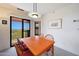 Dining room has sliding door leading to a balcony with scenic views at 9932 N 16Th E Pl, Phoenix, AZ 85020