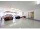 Large two car garage with lots of room for storage and side access door into house at 9932 N 16Th E Pl, Phoenix, AZ 85020