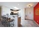 Bright kitchen features a breakfast bar for casual dining at 9932 N 16Th E Pl, Phoenix, AZ 85020