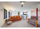 Open-concept living area flows into kitchen featuring ample seating at 9932 N 16Th E Pl, Phoenix, AZ 85020