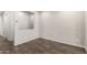 Unfinished basement area with tile flooring, ready to be customized to your specific needs and preferences at 10059 E Tamery Ave, Mesa, AZ 85212
