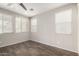 Inviting bedroom with tile flooring and bright windows, offering a comfortable and relaxing space at 10059 E Tamery Ave, Mesa, AZ 85212