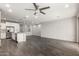 Open concept living area showcasing the kitchen, dining, and living spaces, perfect for modern living at 10059 E Tamery Ave, Mesa, AZ 85212