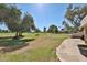 Expansive backyard with a golf course view and mature trees at 1035 N Vista Verde --, Litchfield Park, AZ 85340