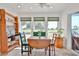 Dining area with views of green outdoor space and travertine floors at 1035 N Vista Verde --, Litchfield Park, AZ 85340