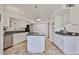 Well-lit kitchen with granite countertops, white cabinets, and stainless steel appliances at 1035 N Vista Verde --, Litchfield Park, AZ 85340