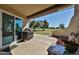 Covered patio overlooking a lush green golf course, perfect for outdoor relaxation and entertainment at 1035 N Vista Verde --, Litchfield Park, AZ 85340