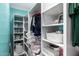 Organized walk-in closet with ample shelving and storage solutions at 10386 N 96Th Pl, Scottsdale, AZ 85258