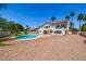 Stunning home exterior showcases a refreshing pool and ample outdoor space at 10386 N 96Th Pl, Scottsdale, AZ 85258