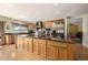 Modern kitchen featuring a center island, stainless appliances, and views of the backyard pool at 10386 N 96Th Pl, Scottsdale, AZ 85258