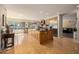 Bright kitchen with a large island, stainless steel appliances, and lots of counter space at 10386 N 96Th Pl, Scottsdale, AZ 85258