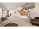Spacious open floor plan with staircase, neutral carpet, and ample natural light at 10386 N 96Th Pl, Scottsdale, AZ 85258
