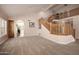 Bright open floor plan with staircase and carpet throughout at 10386 N 96Th Pl, Scottsdale, AZ 85258