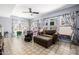 Playroom featuring a ceiling fan, tile floors, and bright, natural light at 10386 N 96Th Pl, Scottsdale, AZ 85258