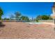 Backyard featuring a sparkling swimming pool with ample space for outdoor enjoyment at 10386 N 96Th Pl, Scottsdale, AZ 85258