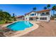 Inviting backyard featuring a sparkling pool and plenty of room for entertaining at 10386 N 96Th Pl, Scottsdale, AZ 85258