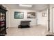 Room showcasing a pet kennel area with neutral colors and tile flooring at 10386 N 96Th Pl, Scottsdale, AZ 85258