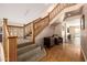 Staircase with carpet and hardwood flooring leading to the living spaces at 10386 N 96Th Pl, Scottsdale, AZ 85258
