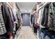 This large walk-in closet provides plenty of room and ample storage space at 10386 N 96Th Pl, Scottsdale, AZ 85258