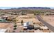 Spacious desert property featuring a single-Gathering home, solar panels, and neighboring houses at 10539 W Tamara Dr, Casa Grande, AZ 85193