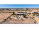 Desert home featuring solar panels, white fencing, xeriscaping, and a covered patio at 10539 W Tamara Dr, Casa Grande, AZ 85193