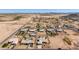 Desert community with a variety of homes, xeriscaping, and fencing at 10539 W Tamara Dr, Casa Grande, AZ 85193