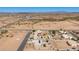 Desert property featuring a single-Gathering home with solar panels and white fencing at 10539 W Tamara Dr, Casa Grande, AZ 85193