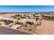 Aerial view of home in a neighborhood with desert landscaping at 10539 W Tamara Dr, Casa Grande, AZ 85193