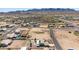 Mountains serve as the backdrop for this desert home, complete with xeriscaping and solar panels at 10539 W Tamara Dr, Casa Grande, AZ 85193