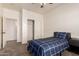 Bright bedroom with a closet and soft carpet, providing a tranquil space at 10539 W Tamara Dr, Casa Grande, AZ 85193